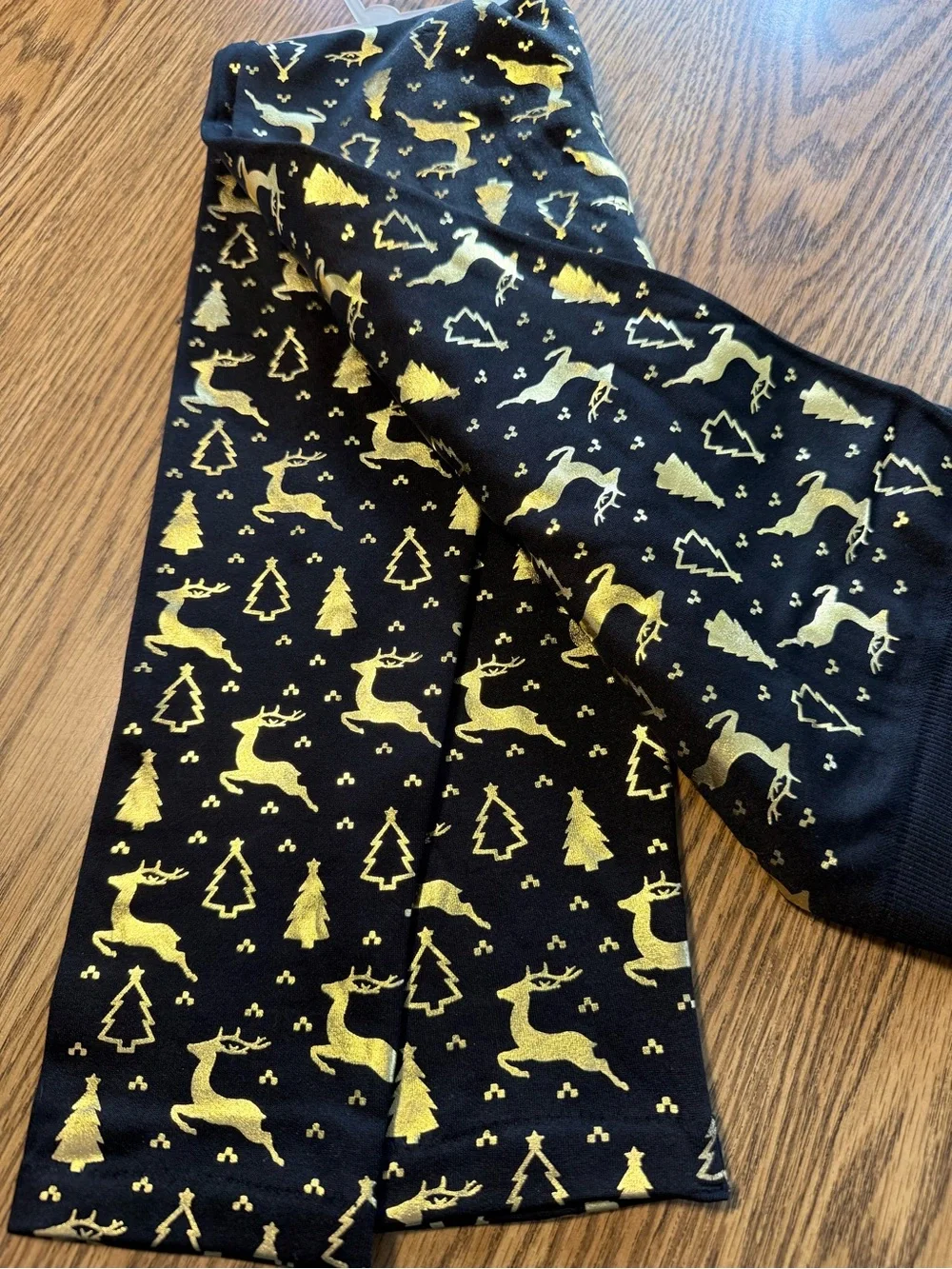NWOT Black Leggings with Shiny Gold Holiday Motif